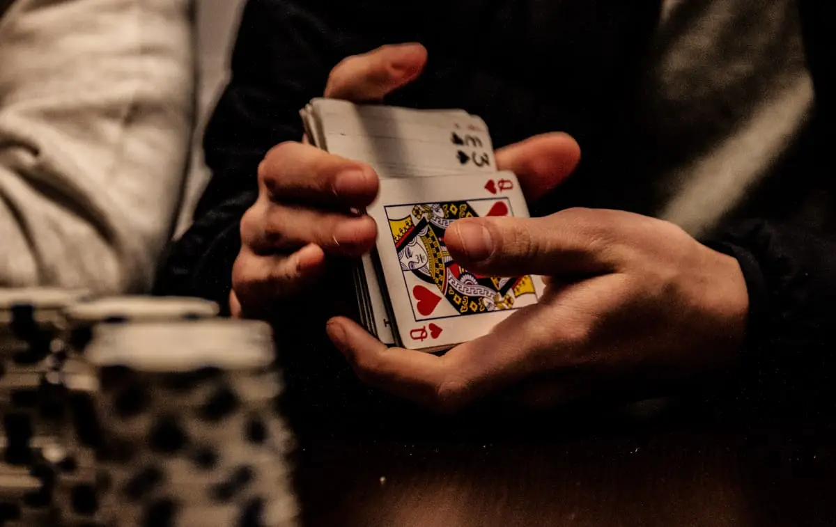 Card dealer performing a card flourish