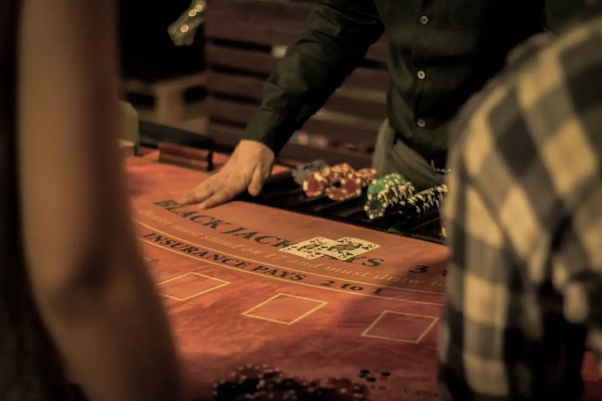 Dealer managing a casino table game