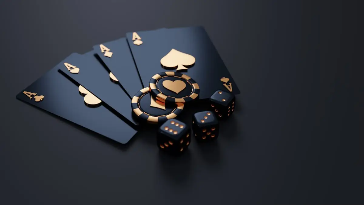 Playing cards and chips on a dark surface